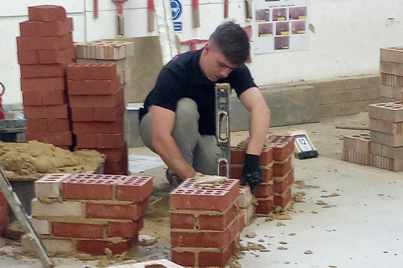 Joe building his winning wall